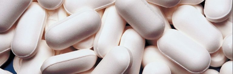White pills.