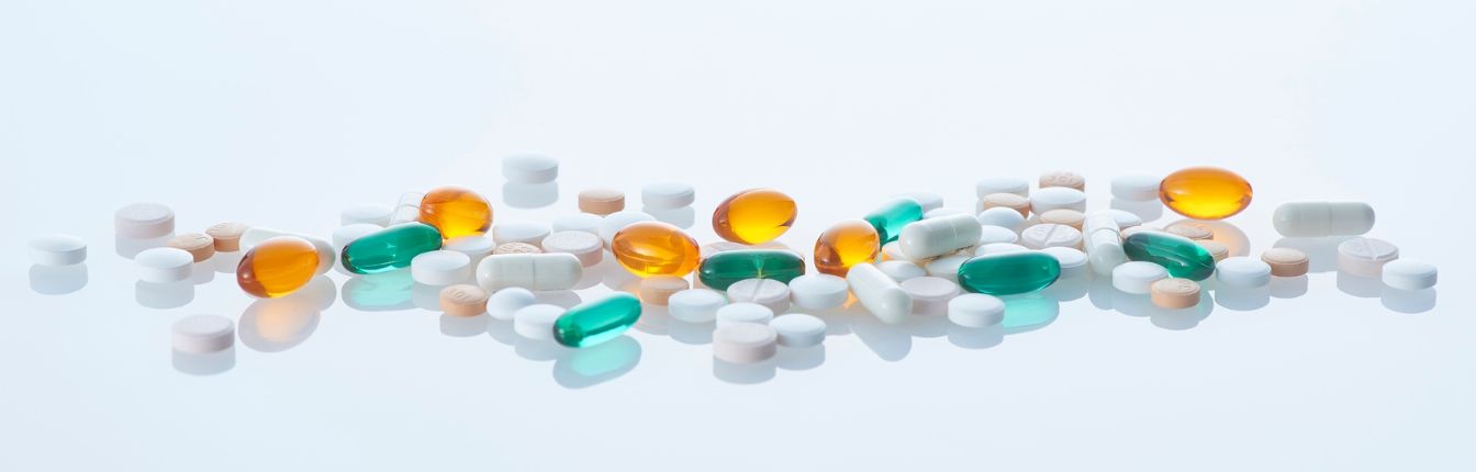 A variety of white, blue and yellow pills